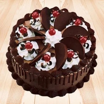 Chocolate Cake With Cherry Toppings