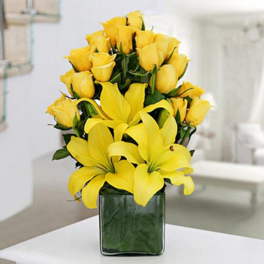 Yellow lily and roses