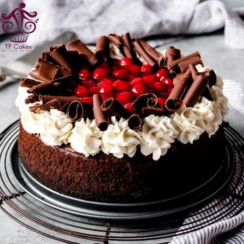 Black forest cake with chocolate roll and cherry