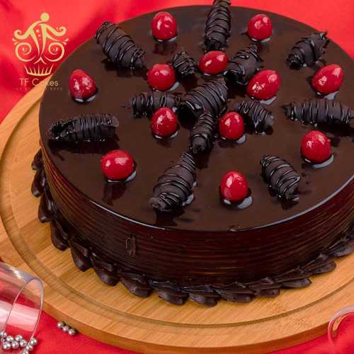 Decadent chocolate cake cherry decorated