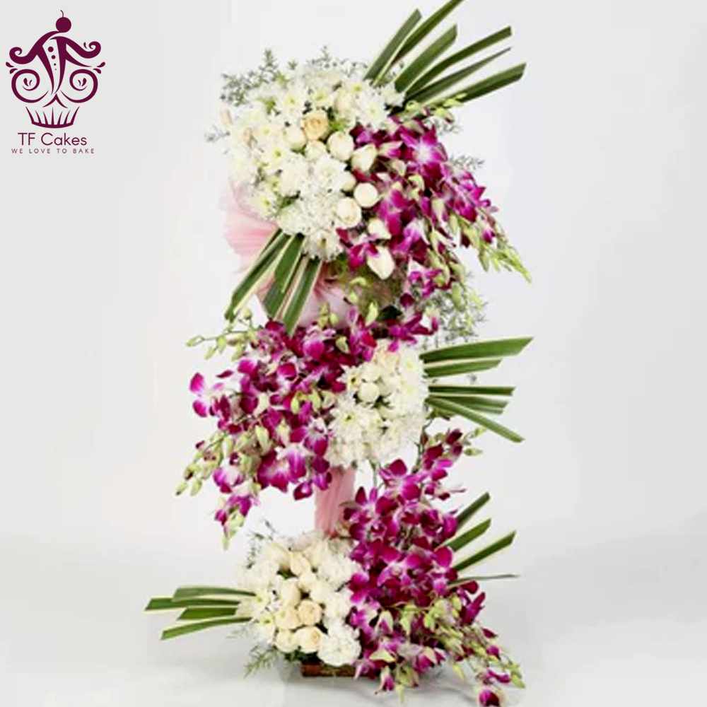 White roses | Purple orchids | Hybrid daisies arranged in Beautiful Flower Bouquet